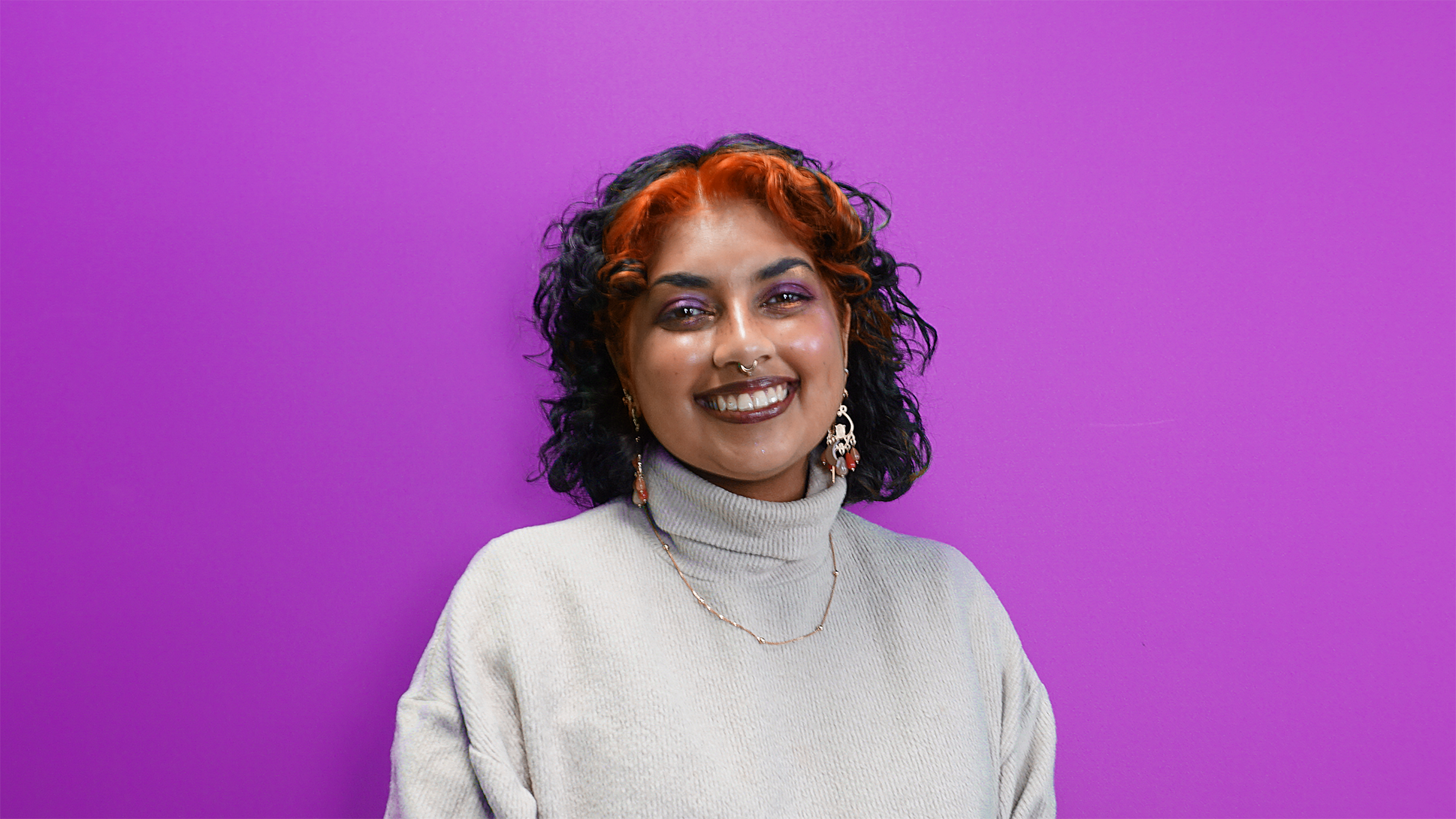 Image of Izzy Jagan on a purple background